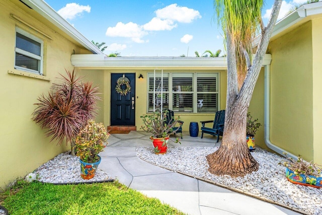 2701 SW 4th St, Boynton Beach, FL 33435 - property entrance with stucco siding