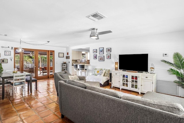 2701 SW 4th St, Boynton Beach, FL 33435 - living room featuring tile patterned floors, ceiling fan, french doors, and visible vents