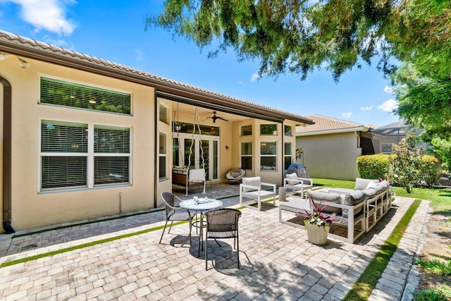 8673 Carmel Mountain Way, Boynton Beach, FL 33473 - view of patio / terrace with a ceiling fan and an outdoor living space