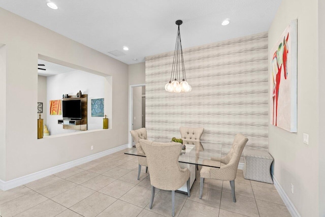 8673 Carmel Mountain Way, Boynton Beach, FL 33473 - dining room featuring an accent wall, baseboards, recessed lighting, tile patterned flooring, and a chandelier