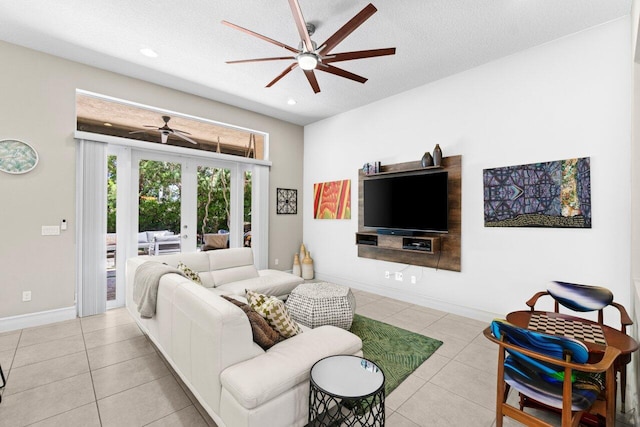 8673 Carmel Mountain Way, Boynton Beach, FL 33473 - tiled living room with a ceiling fan, french doors, recessed lighting, baseboards, and a textured ceiling