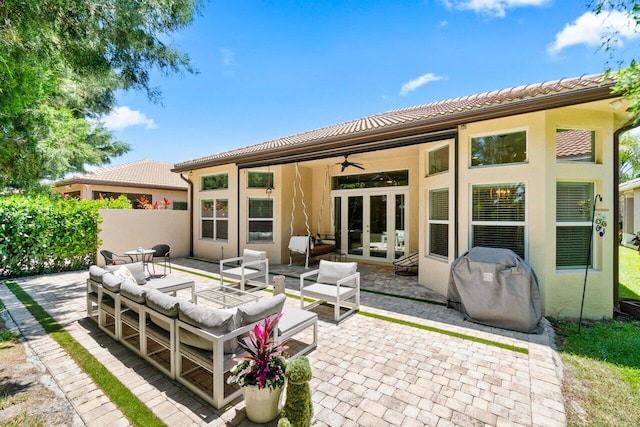 8673 Carmel Mountain Way, Boynton Beach, FL 33473 - back of house with french doors, stucco siding, ceiling fan, and a patio area