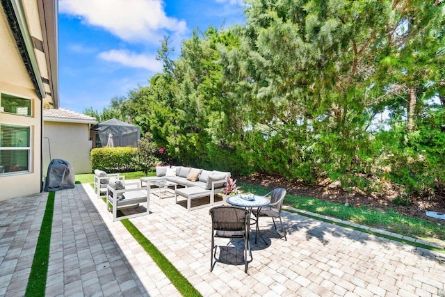 8673 Carmel Mountain Way, Boynton Beach, FL 33473 - view of patio featuring an outdoor hangout area
