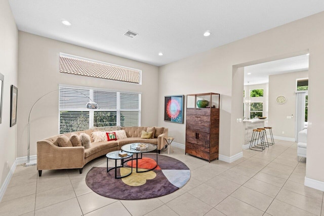 8673 Carmel Mountain Way, Boynton Beach, FL 33473 - living room featuring recessed lighting, baseboards, and light tile patterned floors
