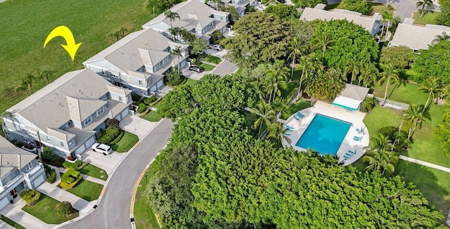 aerial perspective of suburban area with a pool