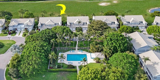 aerial perspective of suburban area with a pool area