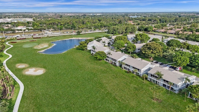 aerial view of residential area with a nearby body of water