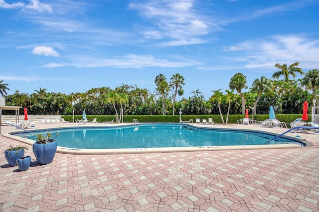 pool with a patio