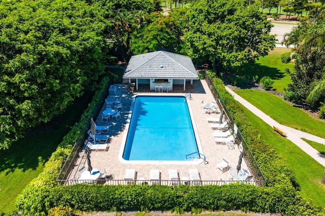 3980 Quail Ridge Dr Egret, Unit Egret, Boynton Beach, FL 33436 - pool featuring fence, an outbuilding, an exterior structure, and a patio area
