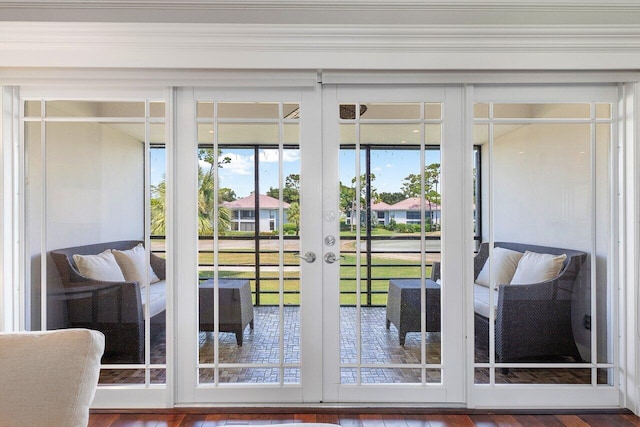 3980 Quail Ridge Dr Egret, Unit Egret, Boynton Beach, FL 33436 - doorway with a healthy amount of sunlight, french doors, and wood finished floors