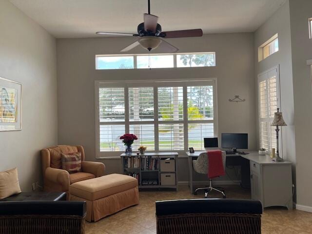 office area with a ceiling fan