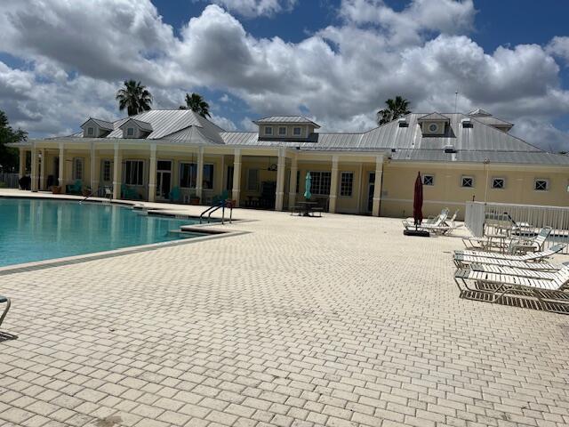 pool featuring a patio area