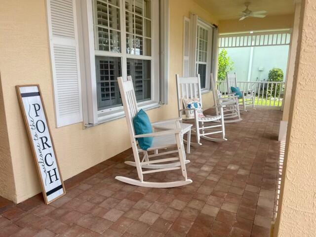 212 NW Pleasant Grove Way, Port Saint Lucie, FL 34986 - porch featuring ceiling fan
