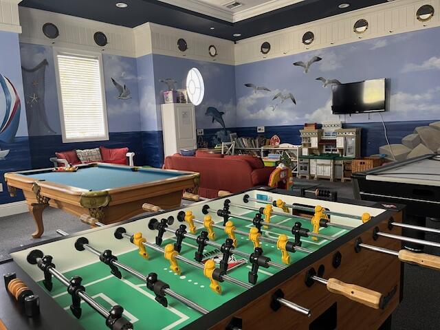 recreation room featuring crown molding and pool table