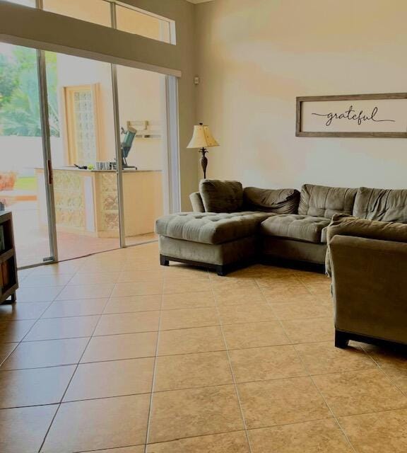living area with light tile patterned flooring