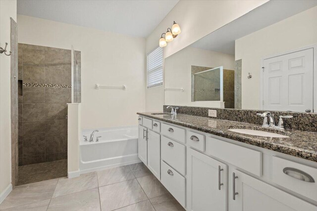 12133 SW Aventino Dr, Port Saint Lucie, FL 34987 - full bath featuring walk in shower, a garden tub, and double vanity