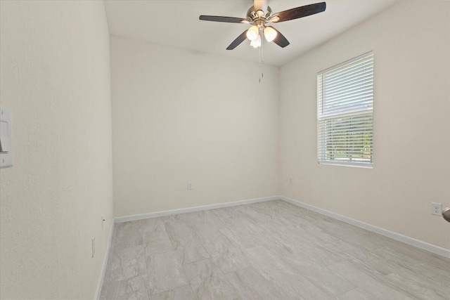 12133 SW Aventino Dr, Port Saint Lucie, FL 34987 - empty room with a ceiling fan and baseboards