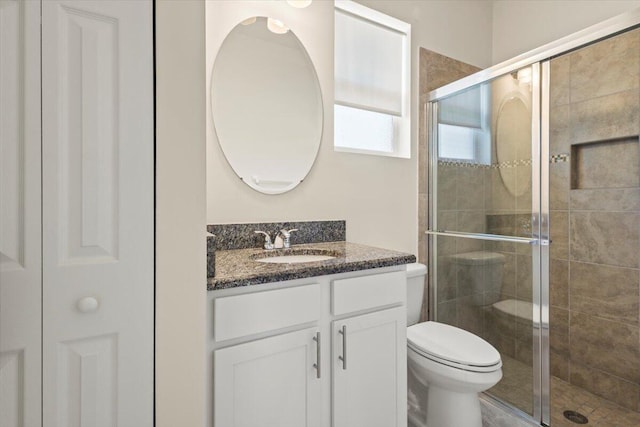 12133 SW Aventino Dr, Port Saint Lucie, FL 34987 - full bathroom with toilet, vanity, and a shower stall