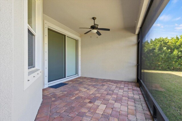 12133 SW Aventino Dr, Port Saint Lucie, FL 34987 - unfurnished sunroom featuring ceiling fan