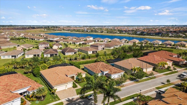12133 SW Aventino Dr, Port Saint Lucie, FL 34987 - aerial view of residential area featuring a nearby body of water