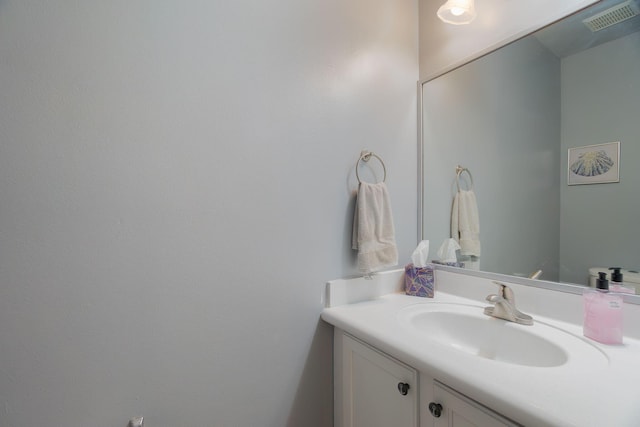 bathroom featuring visible vents and vanity