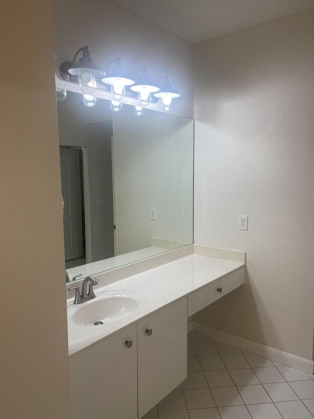 7727 Southampton Ter Unit 305, Tamarac, FL 33321 - bathroom featuring tile patterned flooring, baseboards, and vanity
