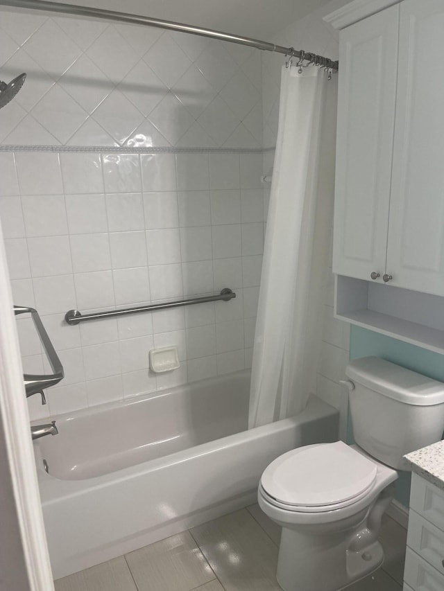 7727 Southampton Ter Unit 305, Tamarac, FL 33321 - bathroom featuring tile patterned flooring, toilet, shower / bath combo with shower curtain, and vanity