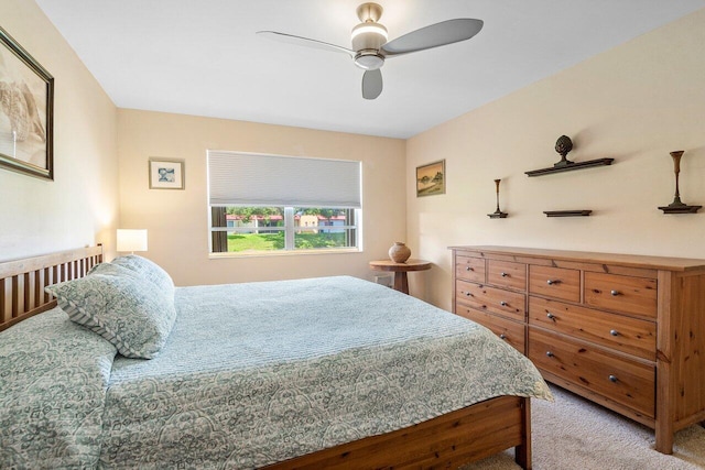 carpeted bedroom with a ceiling fan