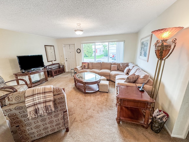 carpeted living room with a textured ceiling