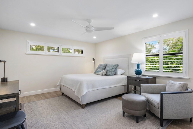 bedroom featuring baseboards, ceiling fan, recessed lighting, and wood finished floors