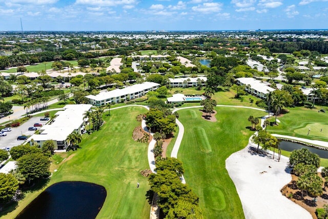 birds eye view of property featuring a residential view, view of golf course, and a water view