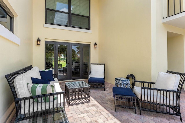view of patio with french doors and an outdoor hangout area