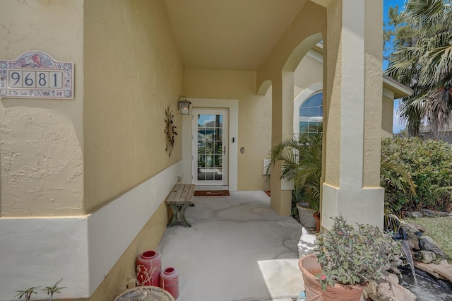 9681 Pine Trail Ct, Lake Worth, FL 33467 - property entrance with stucco siding