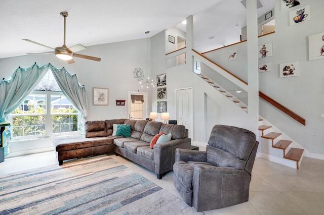 9681 Pine Trail Ct, Lake Worth, FL 33467 - living area with ceiling fan, stairs, high vaulted ceiling, and light tile patterned flooring