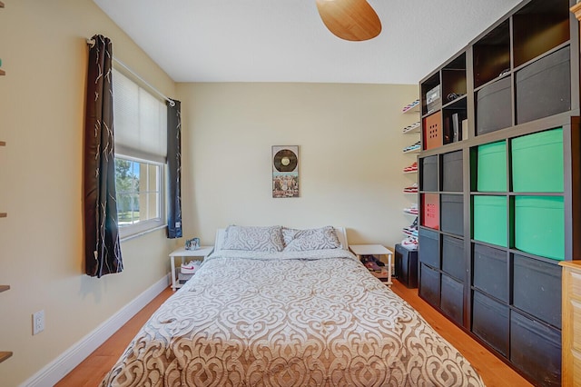 9681 Pine Trail Ct, Lake Worth, FL 33467 - bedroom with wood finished floors and baseboards