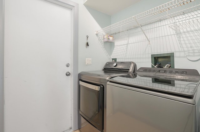 9681 Pine Trail Ct, Lake Worth, FL 33467 - laundry room with washing machine and dryer