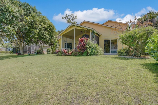 9681 Pine Trail Ct, Lake Worth, FL 33467 - view of front of property with a front lawn and stucco siding
