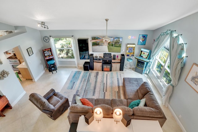 9681 Pine Trail Ct, Lake Worth, FL 33467 - tiled living room with ceiling fan and baseboards