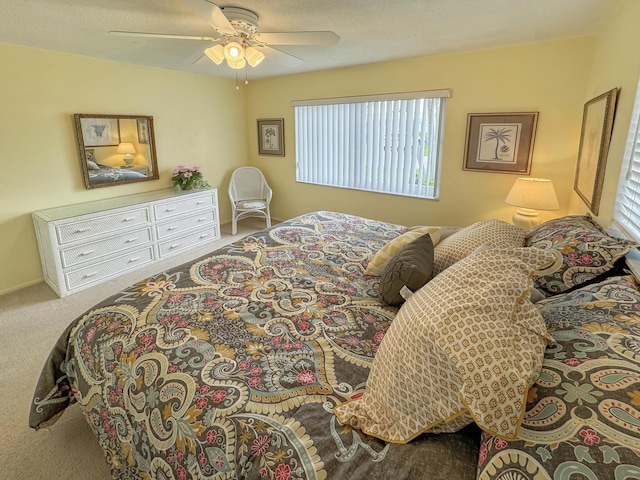 bedroom featuring a ceiling fan and carpet flooring