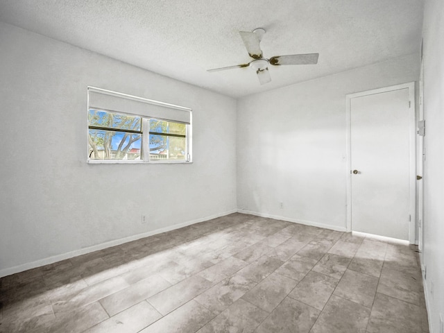 19 Abbey Ln Unit 203, Delray Beach, FL 33446 - empty room with a textured ceiling and ceiling fan