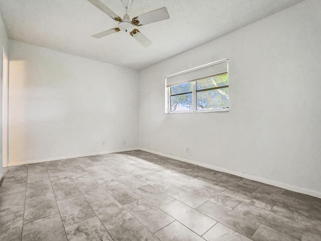 19 Abbey Ln Unit 203, Delray Beach, FL 33446 - empty room featuring baseboards and ceiling fan