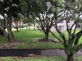 19 Abbey Ln Unit 203, Delray Beach, FL 33446 - view of yard