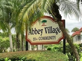 19 Abbey Ln Unit 203, Delray Beach, FL 33446 - view of community / neighborhood sign