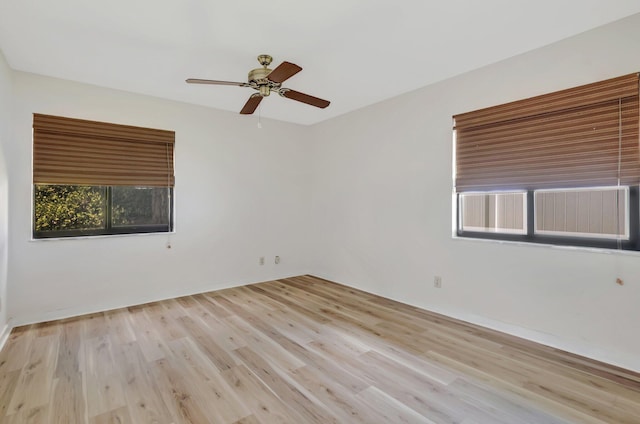 21065 Escondido Way, Boca Raton, FL 33433 - empty room featuring wood finished floors and a ceiling fan