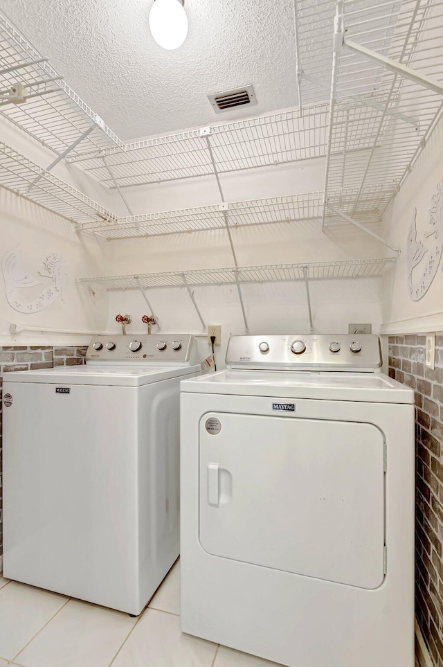 21065 Escondido Way, Boca Raton, FL 33433 - washroom with independent washer and dryer and light tile patterned flooring