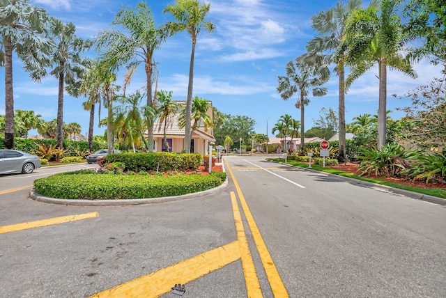 21065 Escondido Way, Boca Raton, FL 33433 - view of asphalt road featuring traffic signs and curbs
