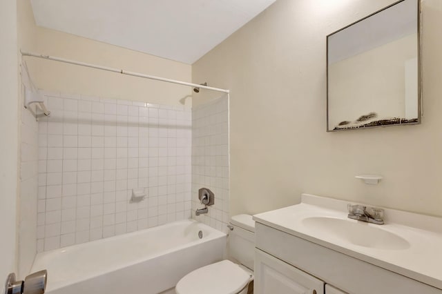 full bathroom featuring toilet, vanity, and bathing tub / shower combination