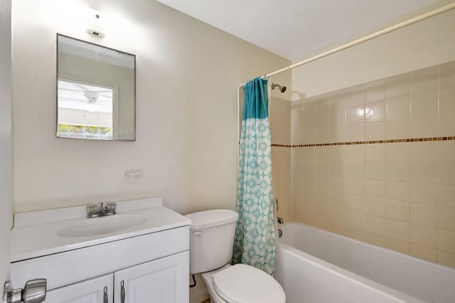 bathroom featuring shower / tub combo, vanity, and toilet