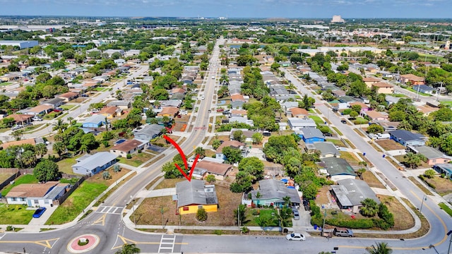 aerial view of property's location featuring nearby suburban area