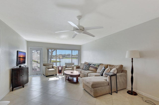 9214 Flynn Cir # 6, Boca Raton, FL 33496 - living area with light tile patterned floors, ceiling fan, and baseboards